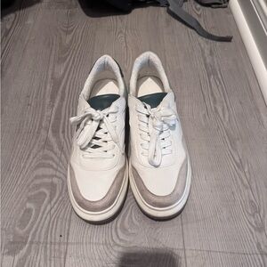 Woman’s White, Blue, and Gray Sneakers